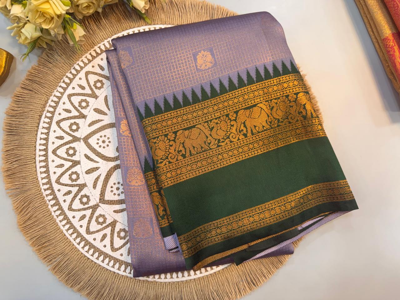 WhatsApp Image 2026-07-31 at 5.48.57 PM Lavender & Green Kanjivaram Silk Saree with Rich Golden Zari Border - Image 1